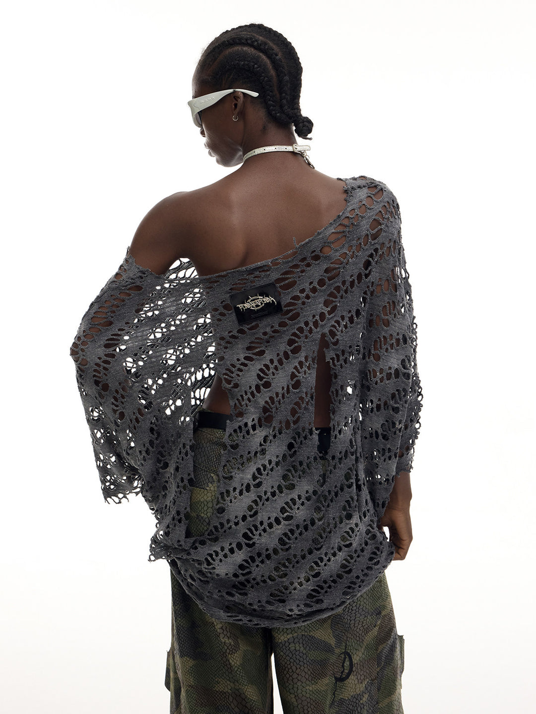PINKSPINK ELECTRIC MOON distressed open-knit oversized tee in charcoal gray — close three-quarter back view showing the open-knit texture