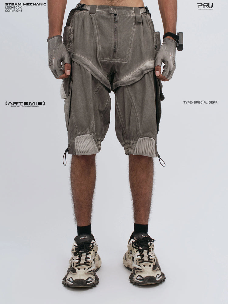 ARTEMIS xirang brown detachable technical shorts — front view showing angled cargo panels and relaxed closed hands