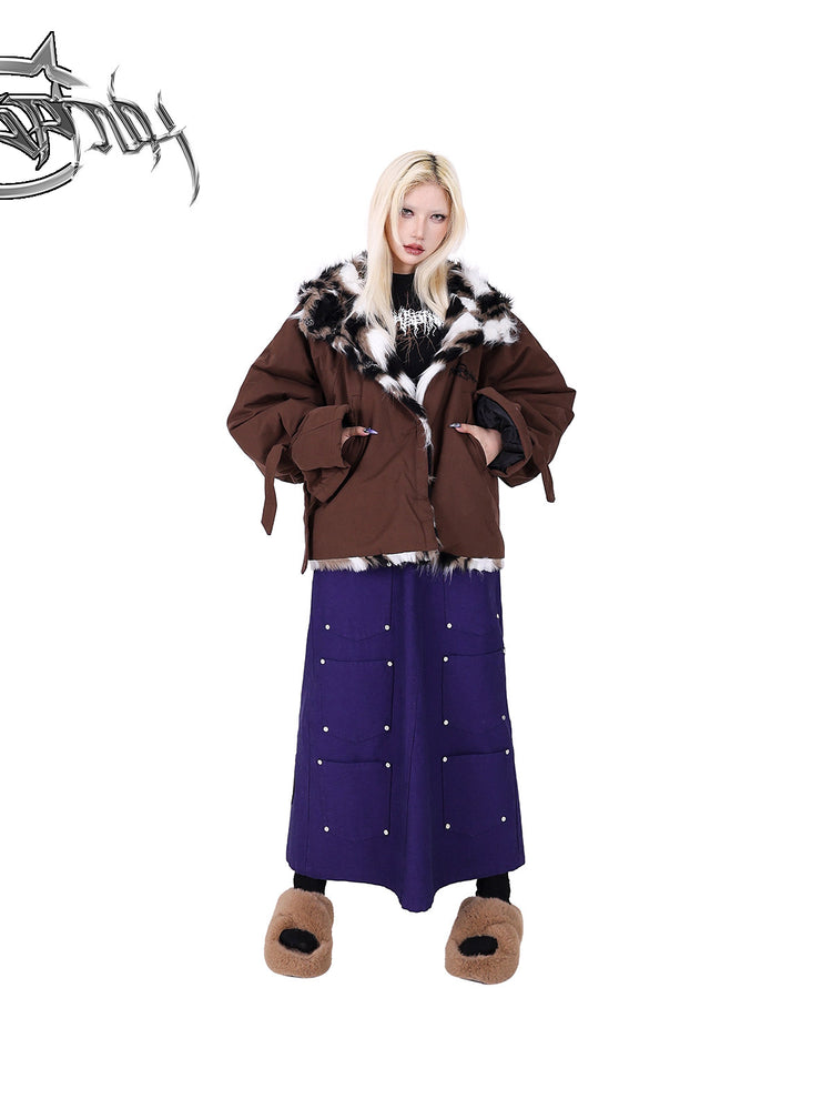 PINKSPINK DNA reconstructed multi-pocket denim maxi skirt — front full-length modeled view with hands in the padded jacket pockets
