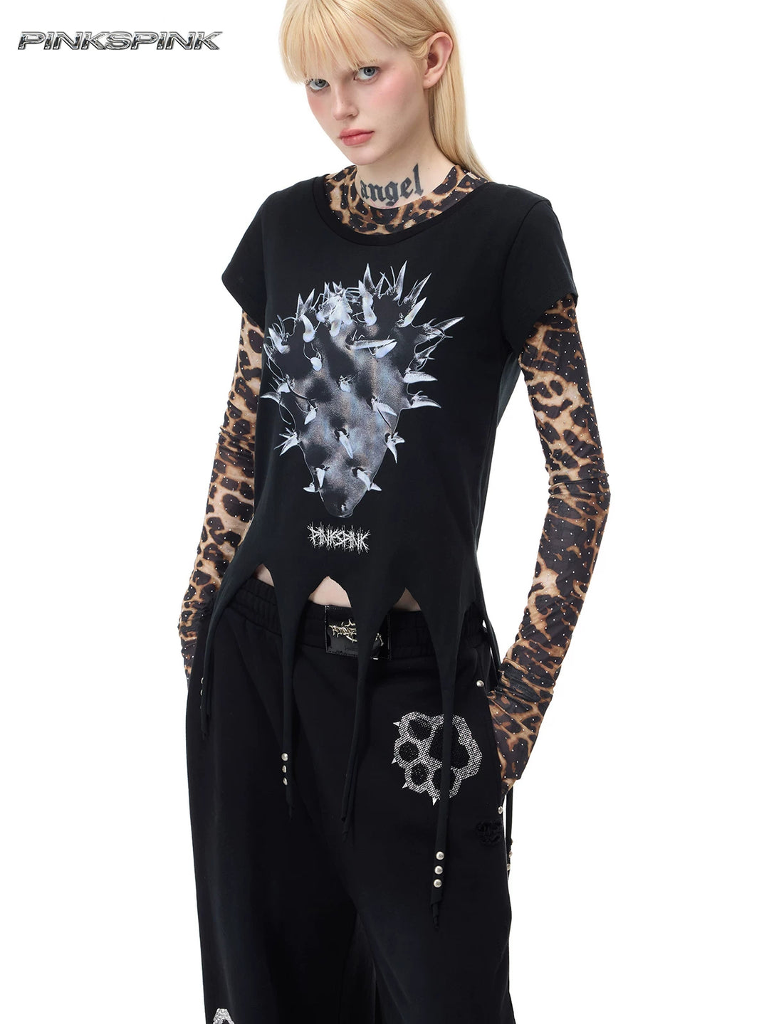 PINKSPINK PUNK CACTUS studded pointed-hem tee in black — close angled front modeled view showing the cactus graphic over a separate leopard mesh top
