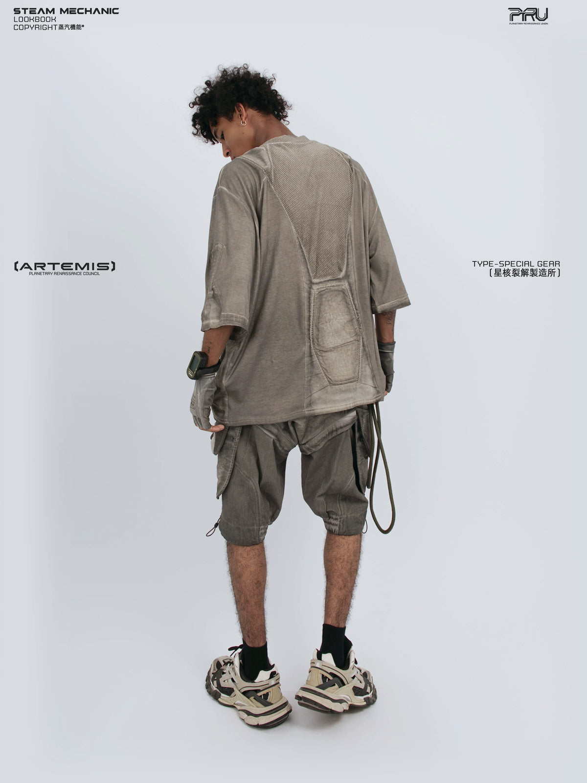 STARCORE xirang brown distressed mesh tee — material and silhouette detail