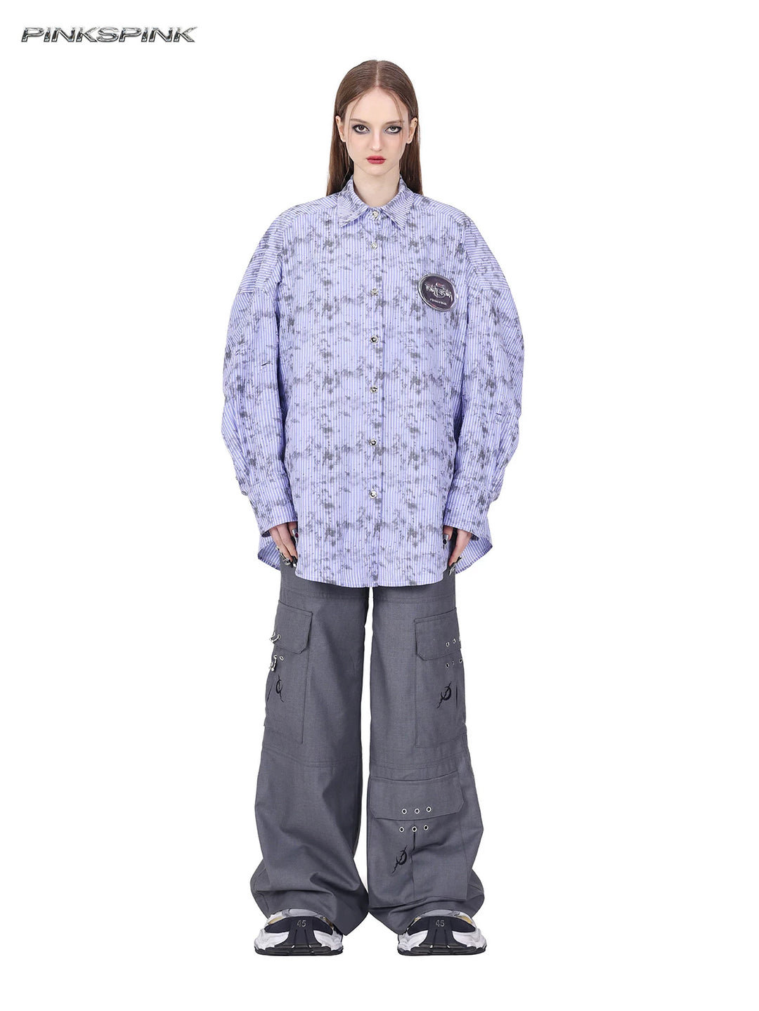 PINKSPINK ELECTRIC MOON ring-detail cargo flare trousers in gray — full-length front view styled with a separate striped shirt