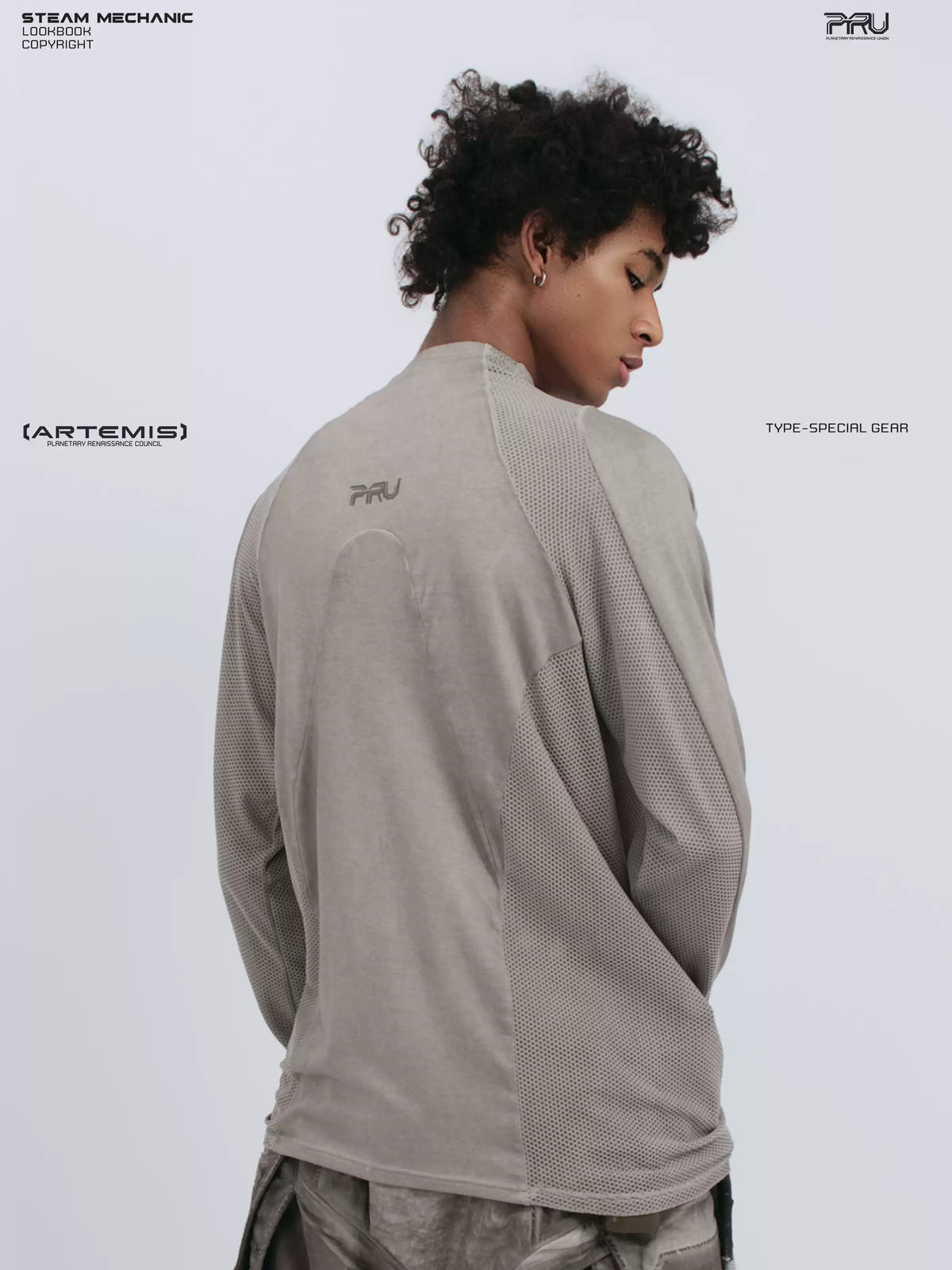 STARCORE mesh-panel long-sleeve top in dusk cloud gray — rear three-quarter modeled close-up