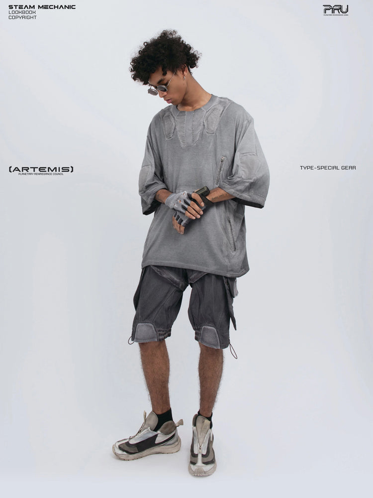STARCORE moon dust gray distressed mesh tee — full-length front view adjusting a glove