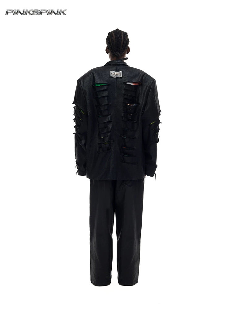 PINKSPINK BREACH distressed coated oversized blazer in black — full-length back modeled view showing rows of distressed slashes