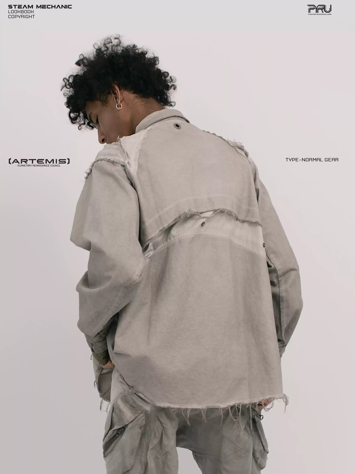 CHAOS ERA nightfall gray raw-edge technical shirt — rear three-quarter view of raw-edge panels and back vent