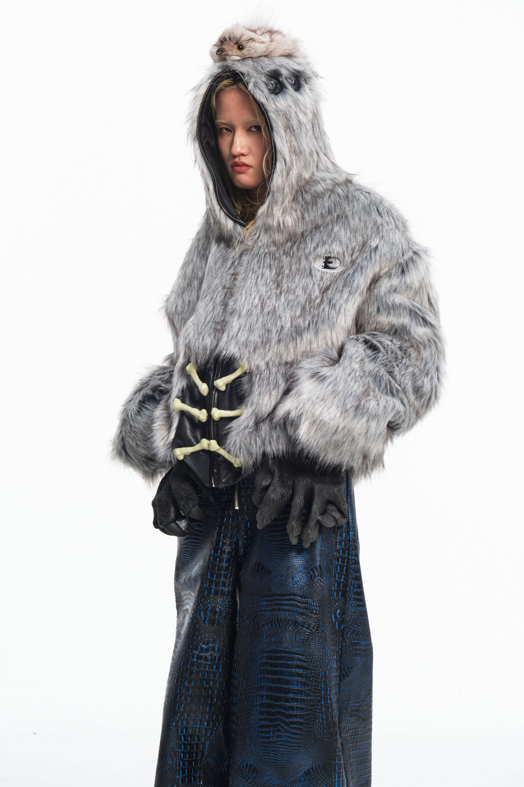 EMBRYO ANIMAL SHELL hooded faux-fur jacket — material and hardware detail