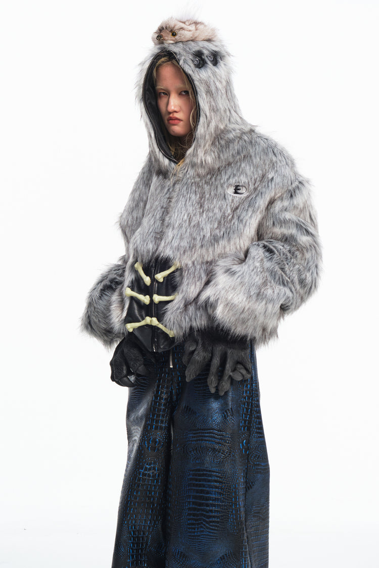 EMBRYO ANIMAL SHELL hooded faux-fur jacket — material and hardware detail