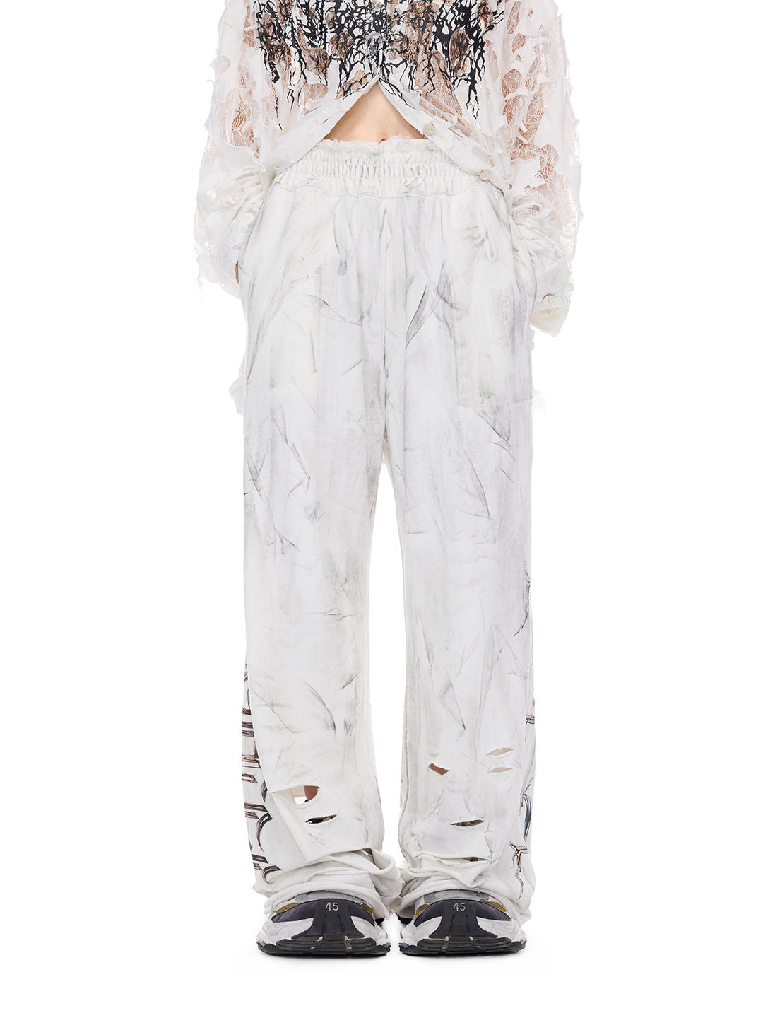 PINKSPINK ELECTRIC MOON coated distressed flare sweatpants — product detail view showing texture and hardware