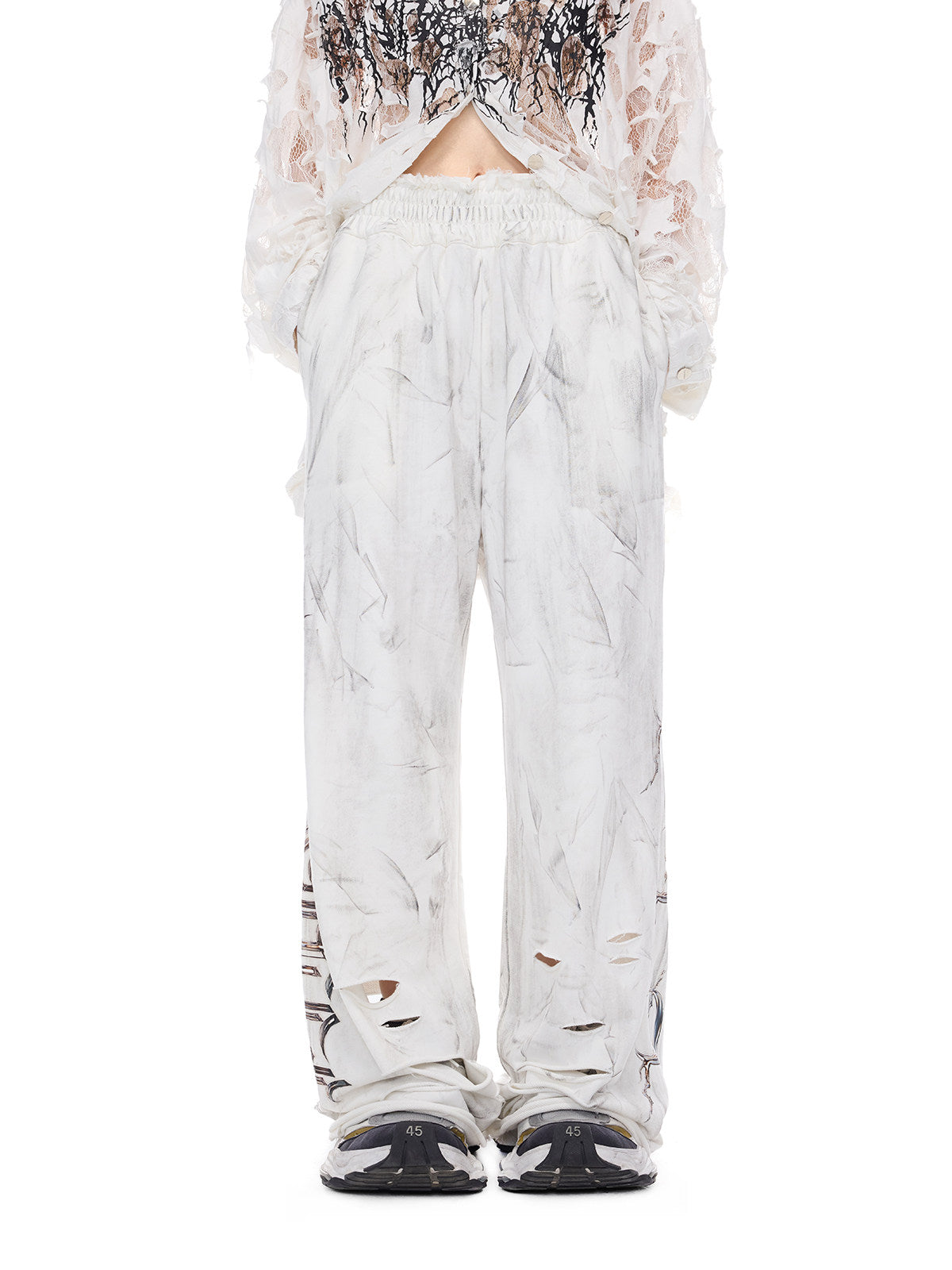 PINKSPINK ELECTRIC MOON coated distressed flare sweatpants — product detail view showing texture and hardware