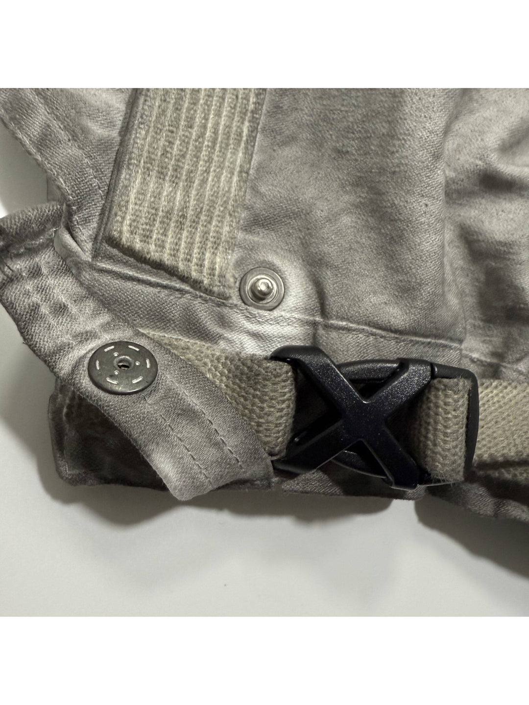 PIONEER meteor gray knee-mesh utility work pants — waist buckle and webbing attachment close-up