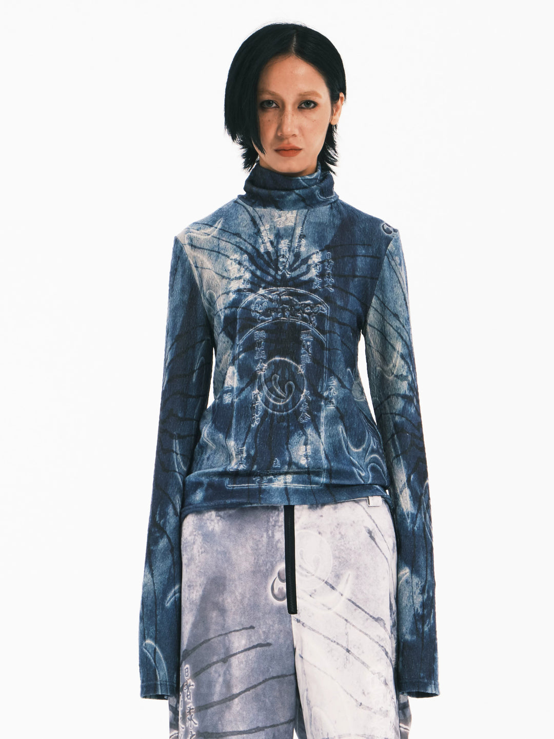 EMBRYO ANCIENT CODE textured mock-neck top — front modeled view