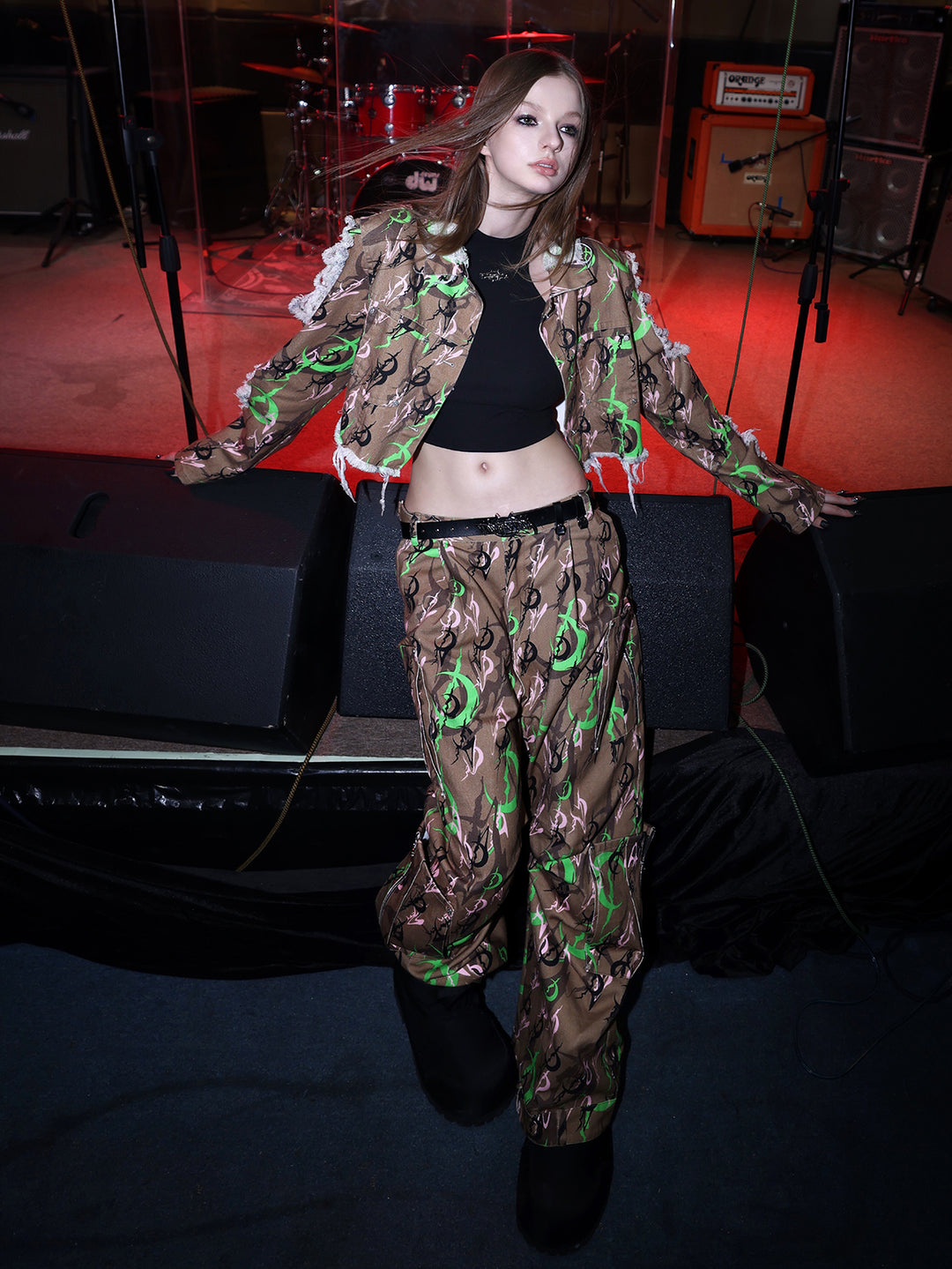 PINKSPINK ELECTRIC MOON distressed camo cropped jacket in CAMOUFLAGE — full-body front view with arms extended.