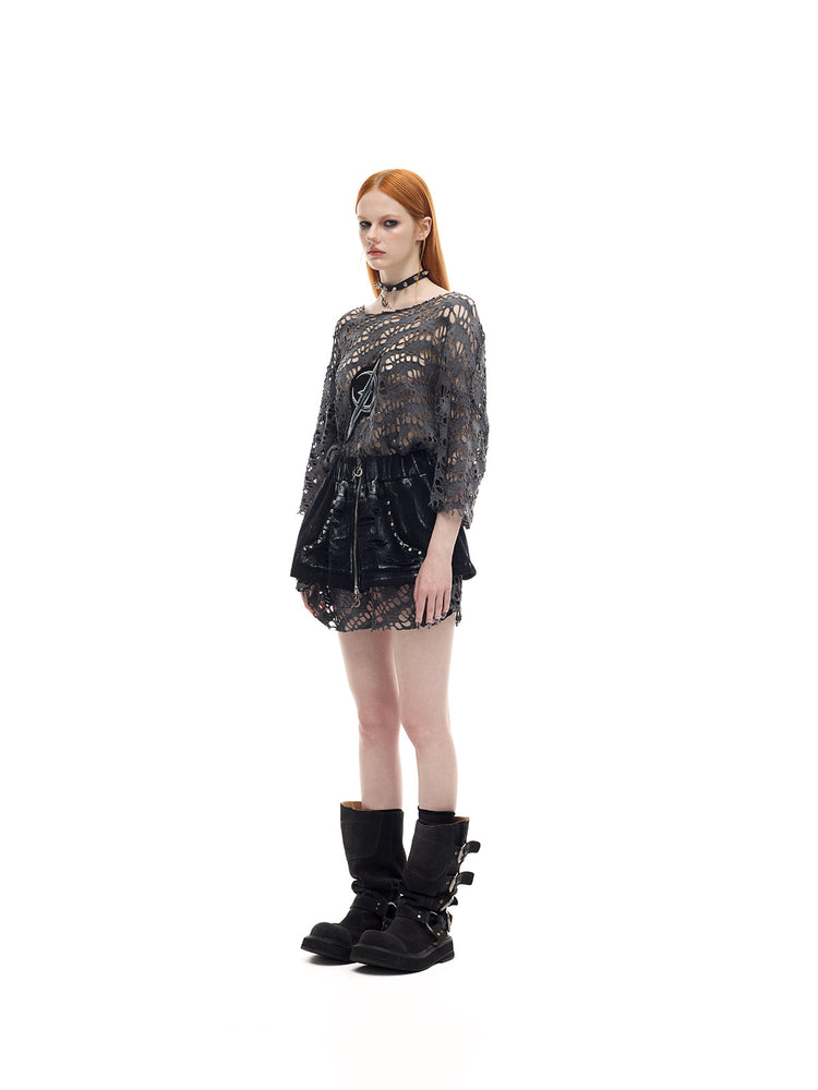 PINKSPINK ELECTRIC MOON distressed open-knit oversized tee in charcoal gray — full-length angled modeled view with black shorts