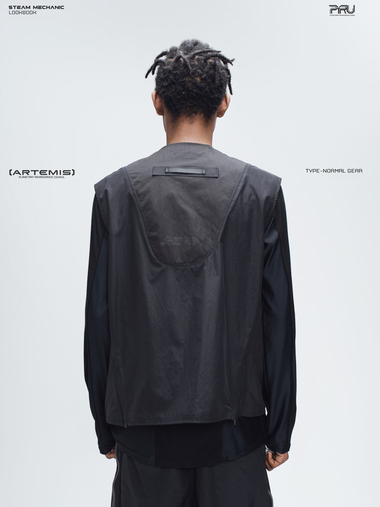 CLERIC utility nylon vest in stardust black — back modeled view showing the curved panel and webbing loop
