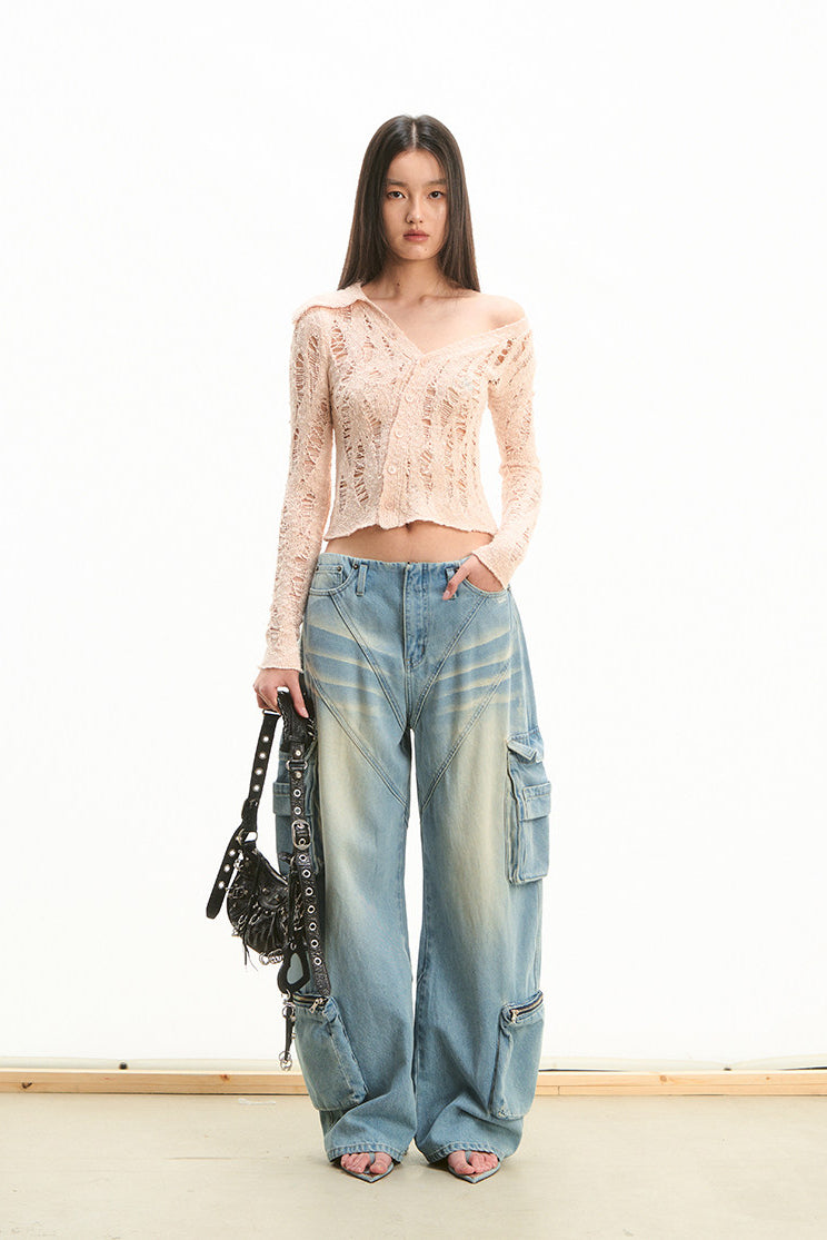 NAWS NOMAD asymmetric cutout knit cardigan — product detail view showing texture and hardware