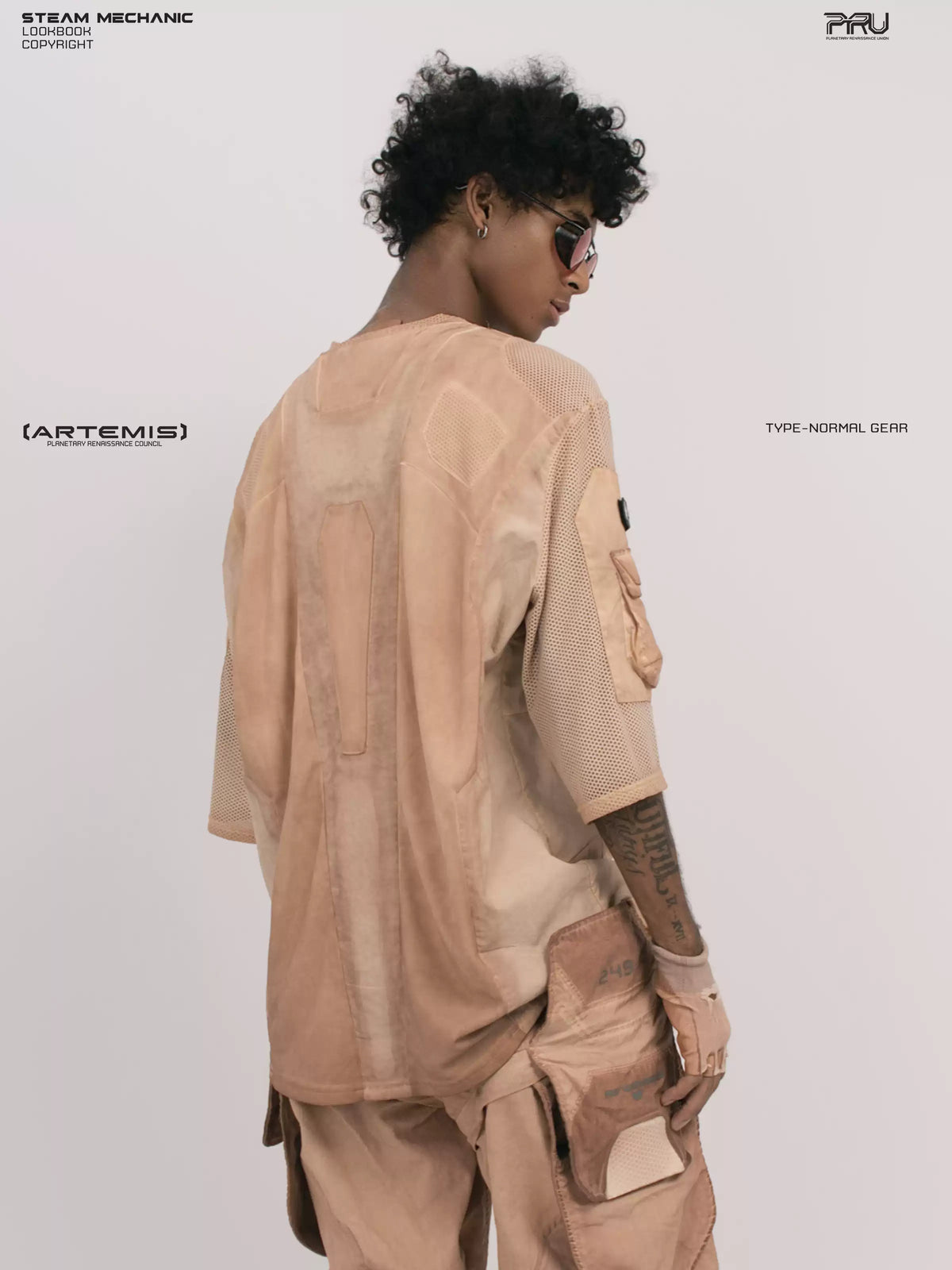 STARCORE soft dawn orange velcro mesh tee — rear three-quarter modeled view showing mesh panels