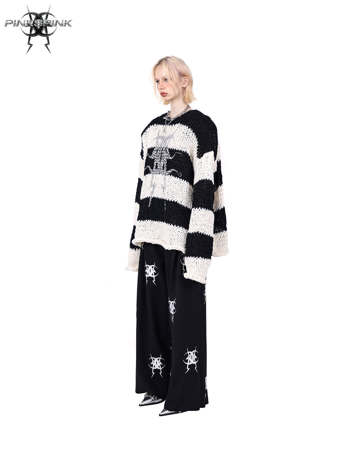 PINKSPINK MIRROR striped open-knit padded-shoulder sweater in black white stripes — side full-length modeled view without the matching balaclava