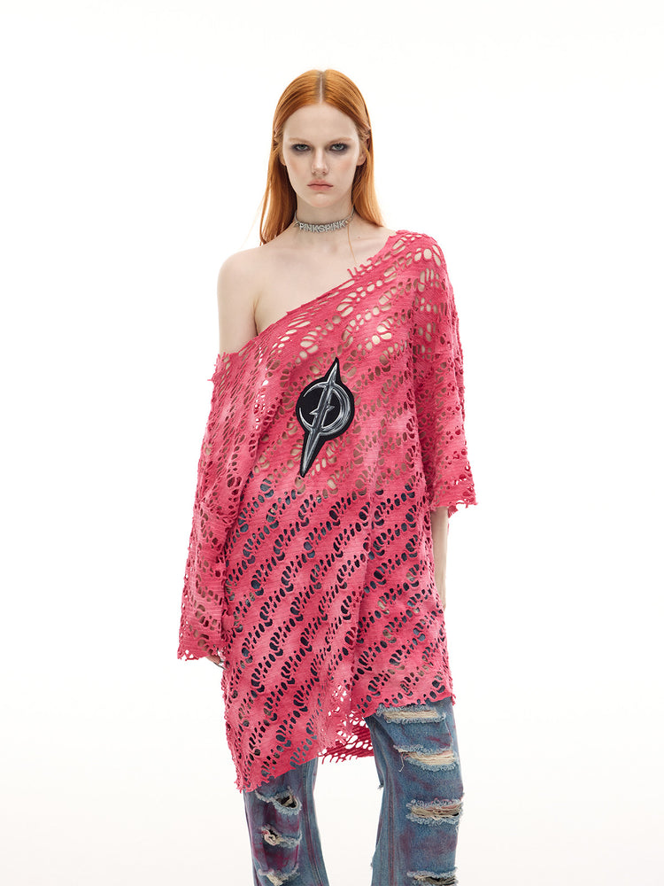 PINKSPINK ELECTRIC MOON distressed open-knit oversized tee in pink — mid-length front modeled view showing the loose sleeves