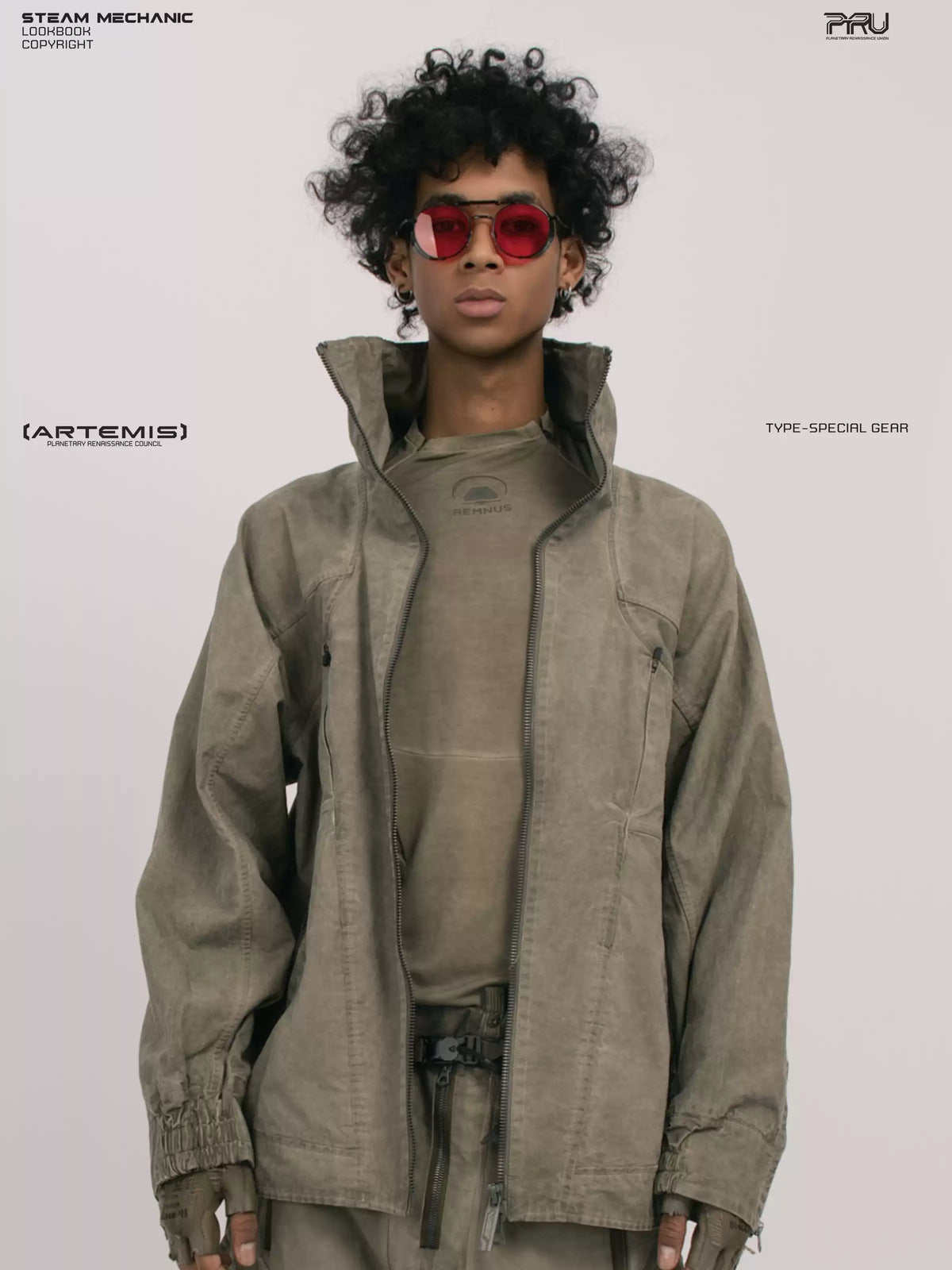 ARTEMIS xirang brown tuck-paneled technical jacket — close modeled front view with the jacket open