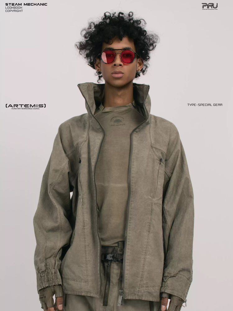 ARTEMIS xirang brown tuck-paneled technical jacket — close modeled front view with the jacket open
