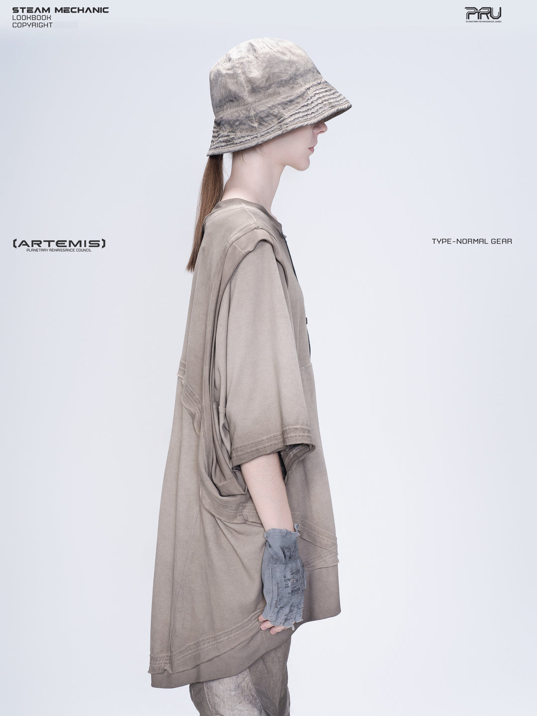 PIONEER mercury brown distressed nylon bucket hat — right-facing modeled view with the ponytail behind the hat
