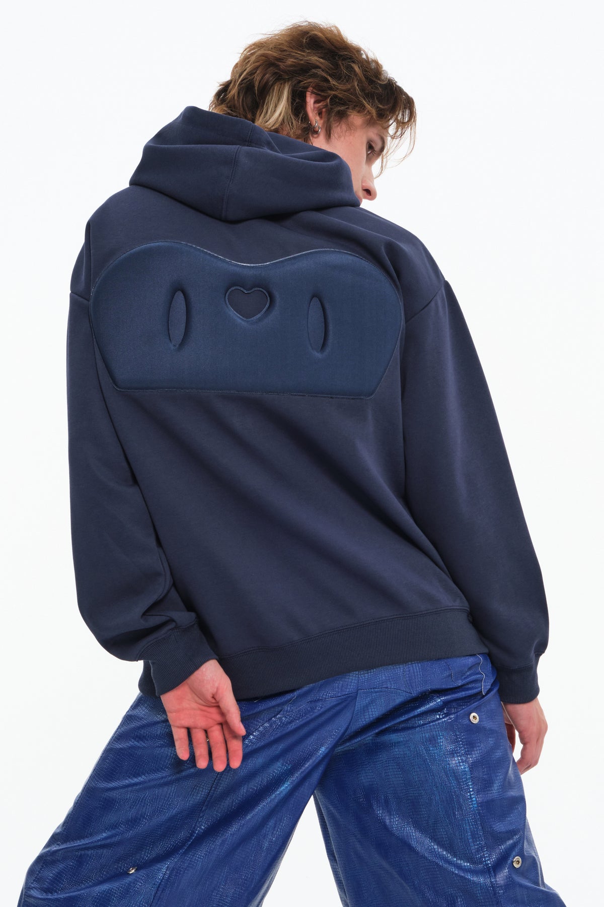 EMBRYO IMPACT SHIELD padded hoodie — navy close rear view of the padded back panel and heart cutout