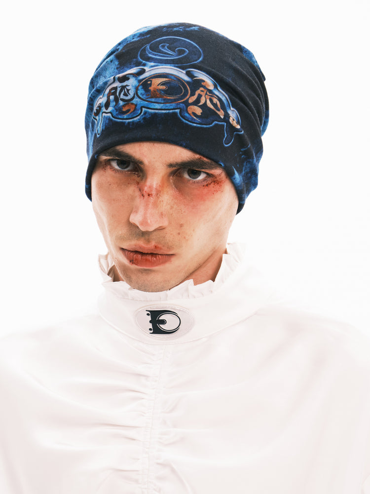 EMBRYO ANCIENT CODE graphic slouch beanie — material and hardware detail