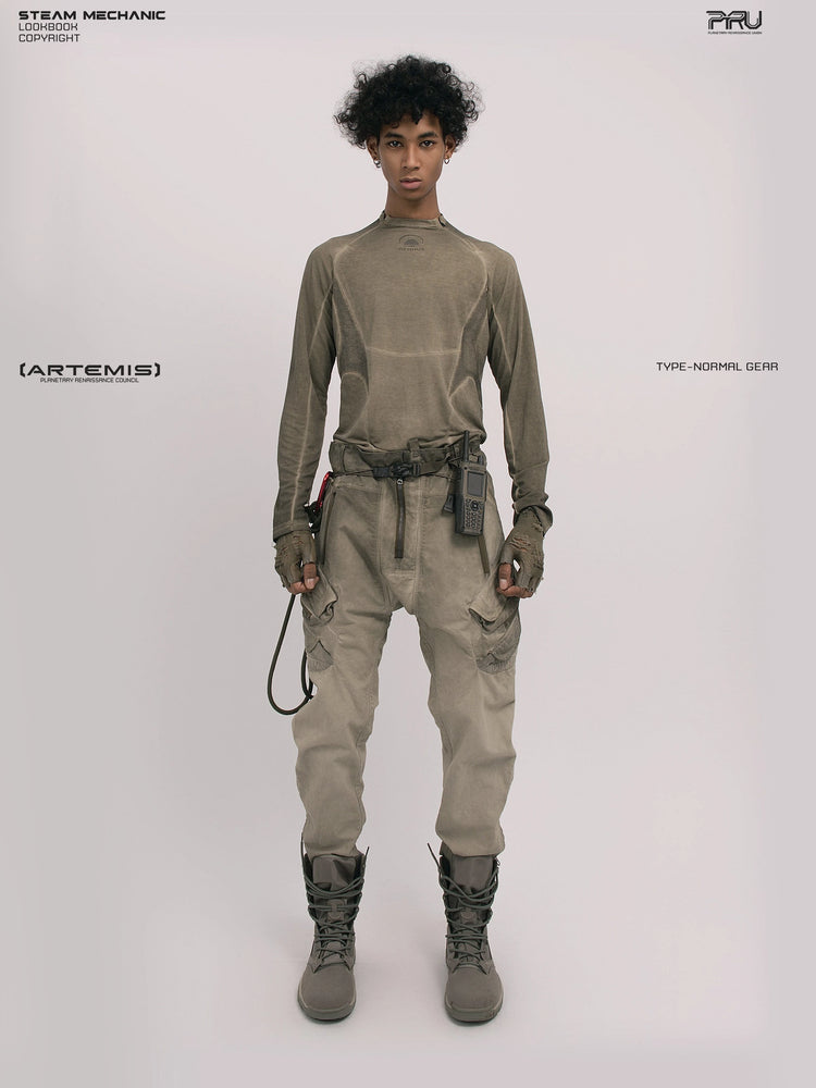 TWIN STAR lunar soil teal stretch riding base-layer top — full-length front modeled view