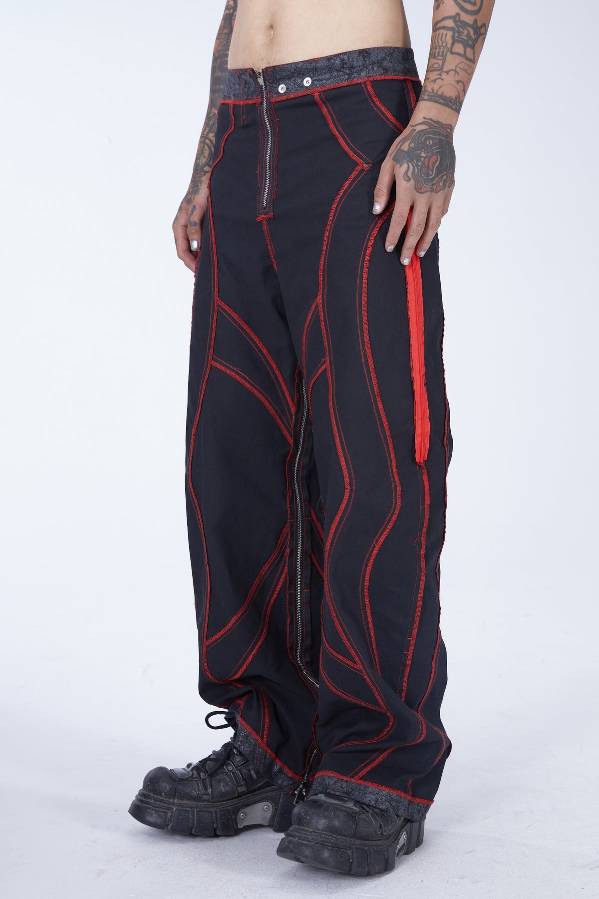 EMBRYO STRUCTURE convertible bustier & wide-leg pants — black reverse trouser configuration, three-quarter modeled view