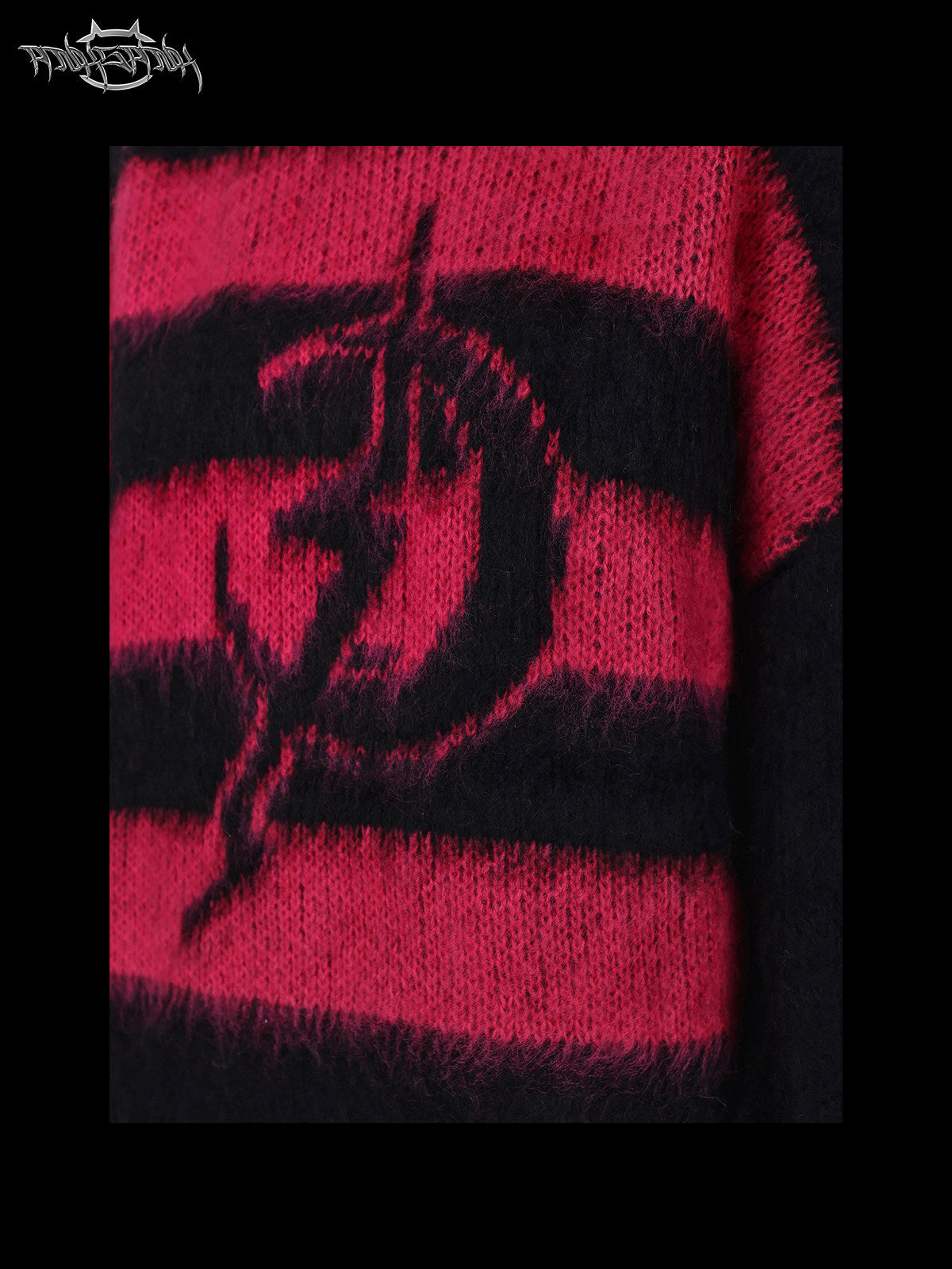 PINKSPINK ELECTRIC MOON black-pink striped sweater in black pink — close-up of the electric-moon motif and fuzzy knit texture