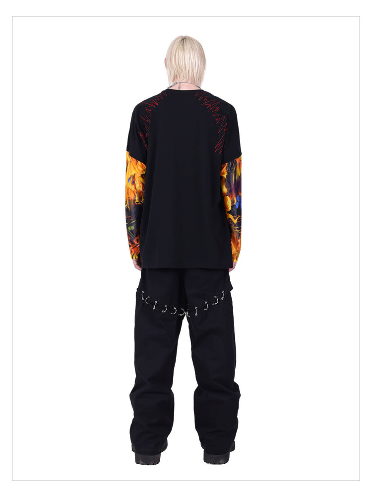 PINKSPINK FIRE CAT layered-sleeve graphic tee — alternate angle showing the shape and finish