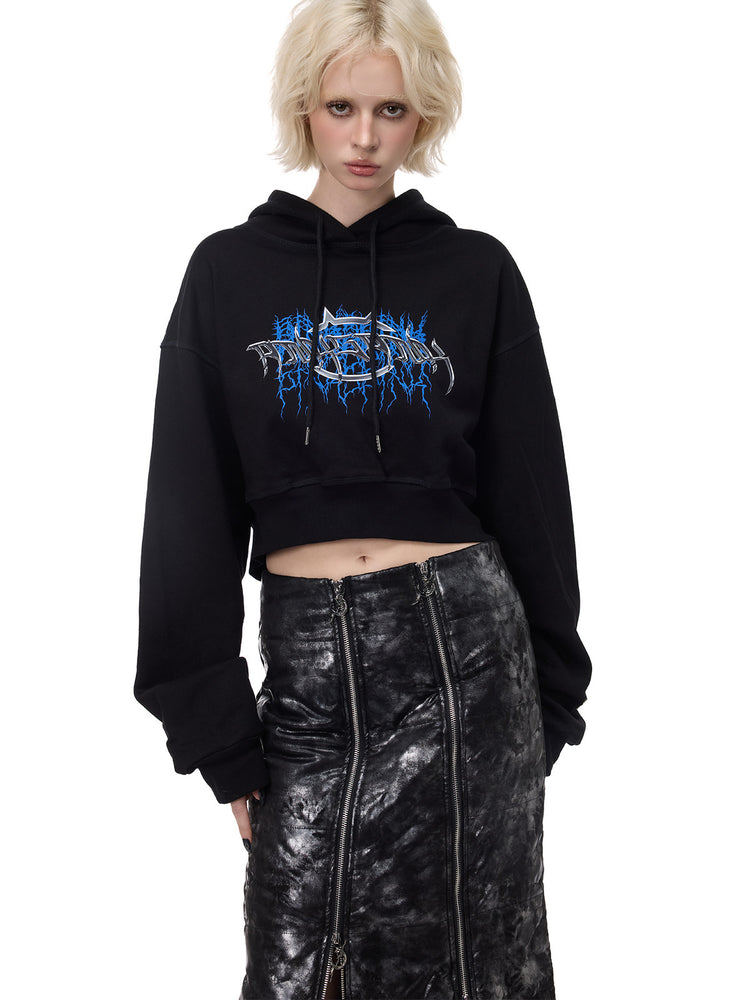 PINKSPINK THORN SIGNAL open-back cropped hoodie — black front modeled detail of graphic and cropped hem