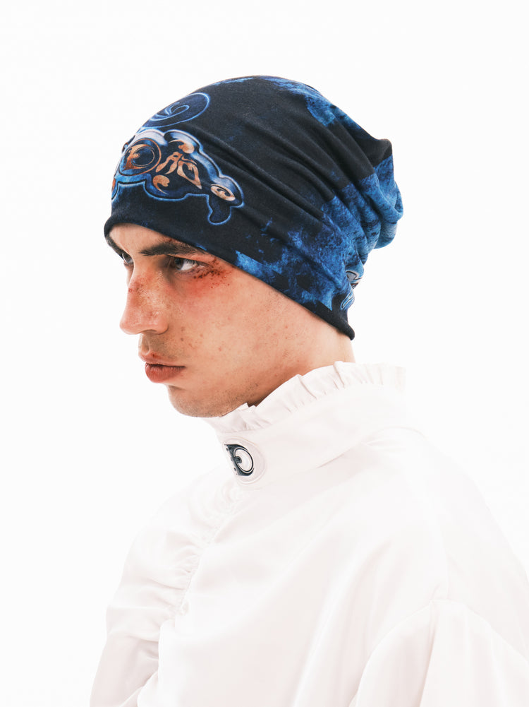 EMBRYO ANCIENT CODE graphic slouch beanie — rear modeled view