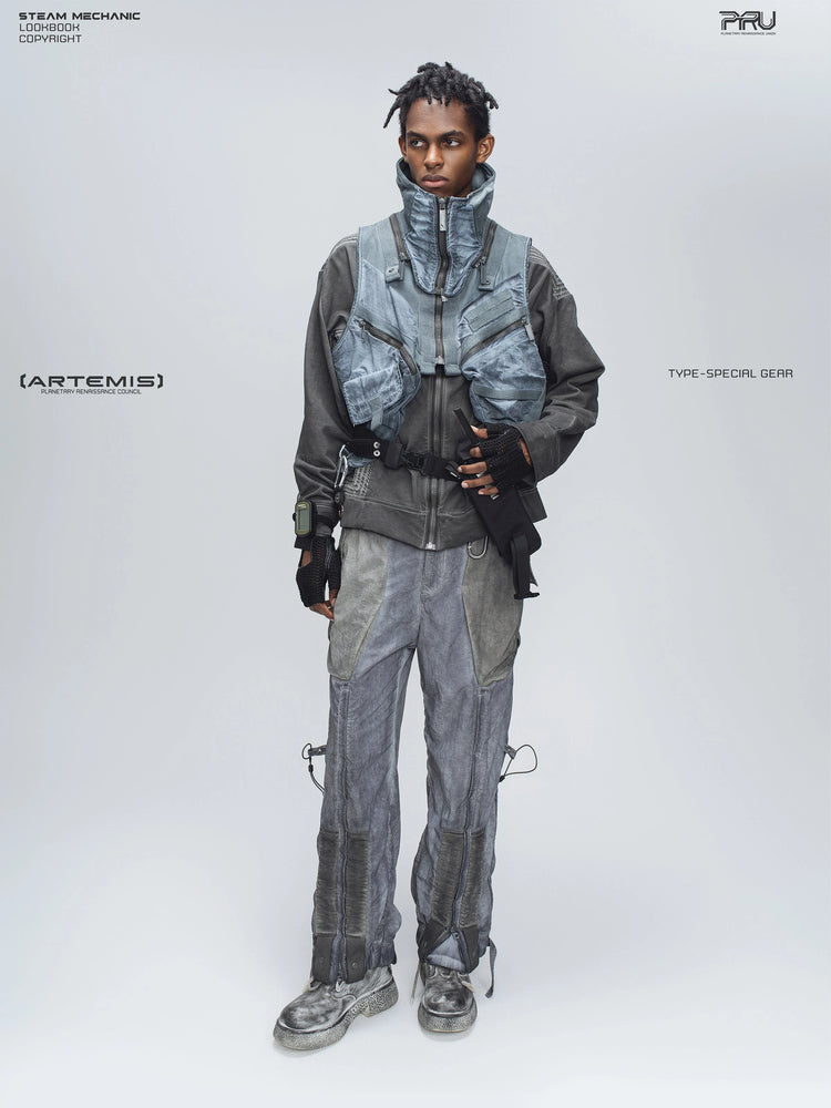 STARCORE moon dust gray engineer utility pants — full-length modeled view styled with a blue utility vest