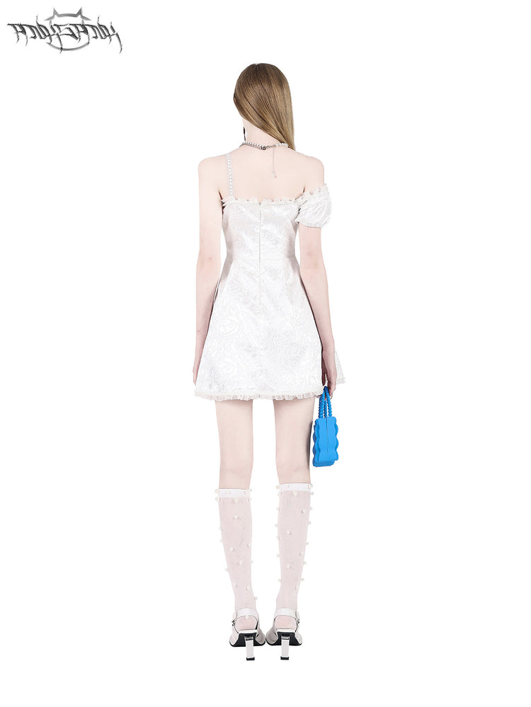 PINKSPINK FAIRY pearl-trim asymmetric mini dress — back full-length modeled view showing the rear fastening