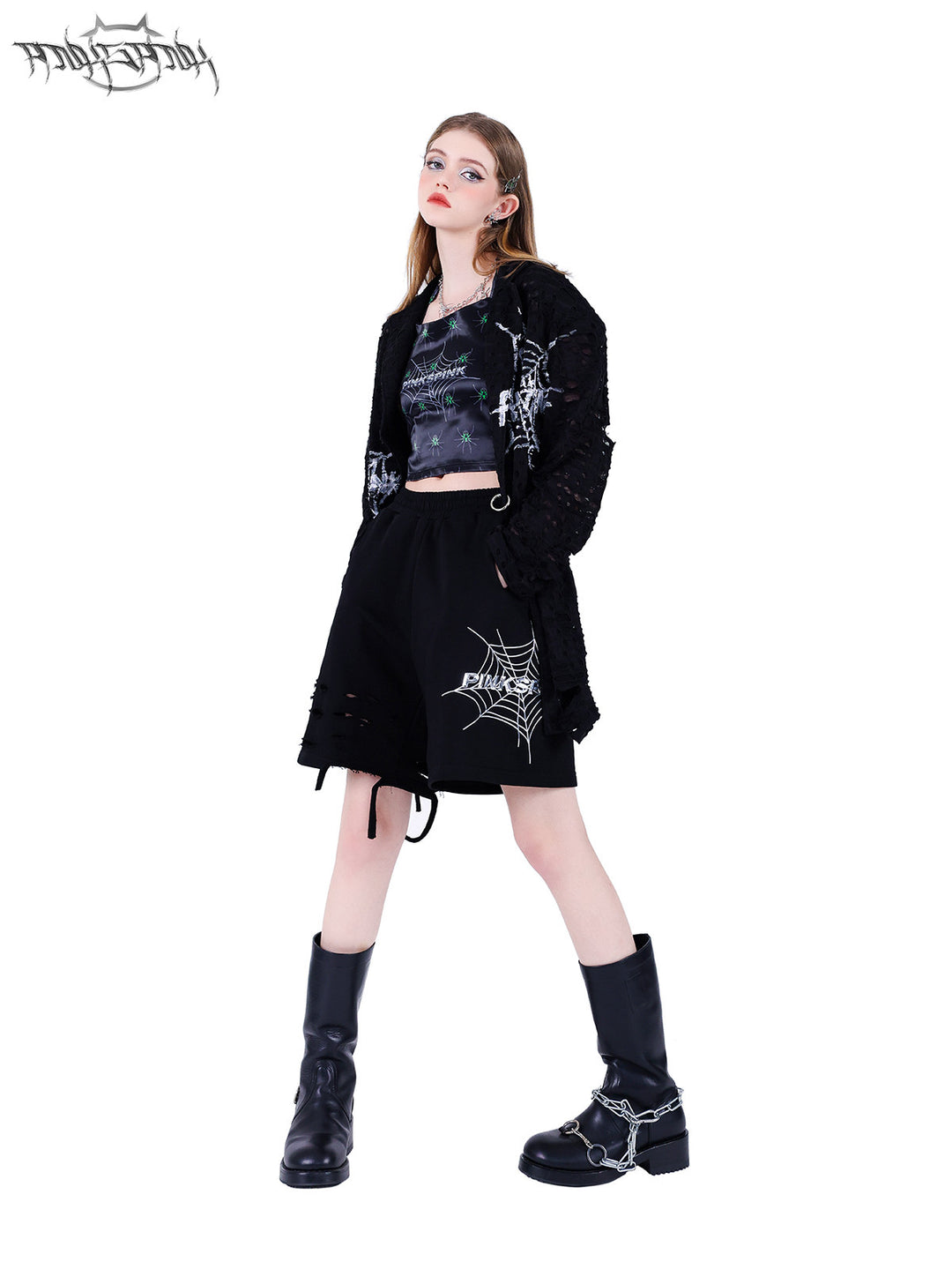PINKSPINK SPIDER web-mesh halter crop top — full-length modeled view styled with an open jacket and shorts