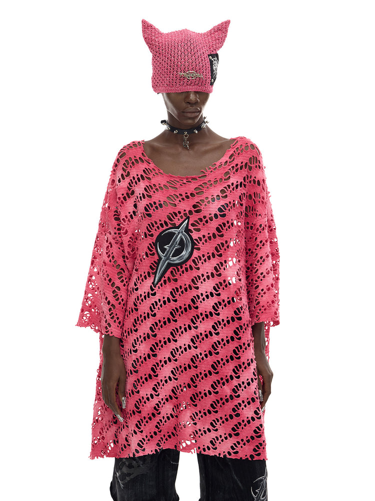 PINKSPINK ELECTRIC MOON distressed open-knit oversized tee in pink — mid-length front modeled view showing the oversized silhouette