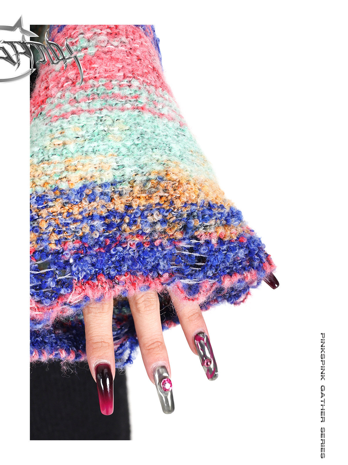 PINKSPINK ELECTRIC MOON rainbow-sleeve cropped sweater with scarf — close-up of the multicolor knit texture and flared sleeve cuff