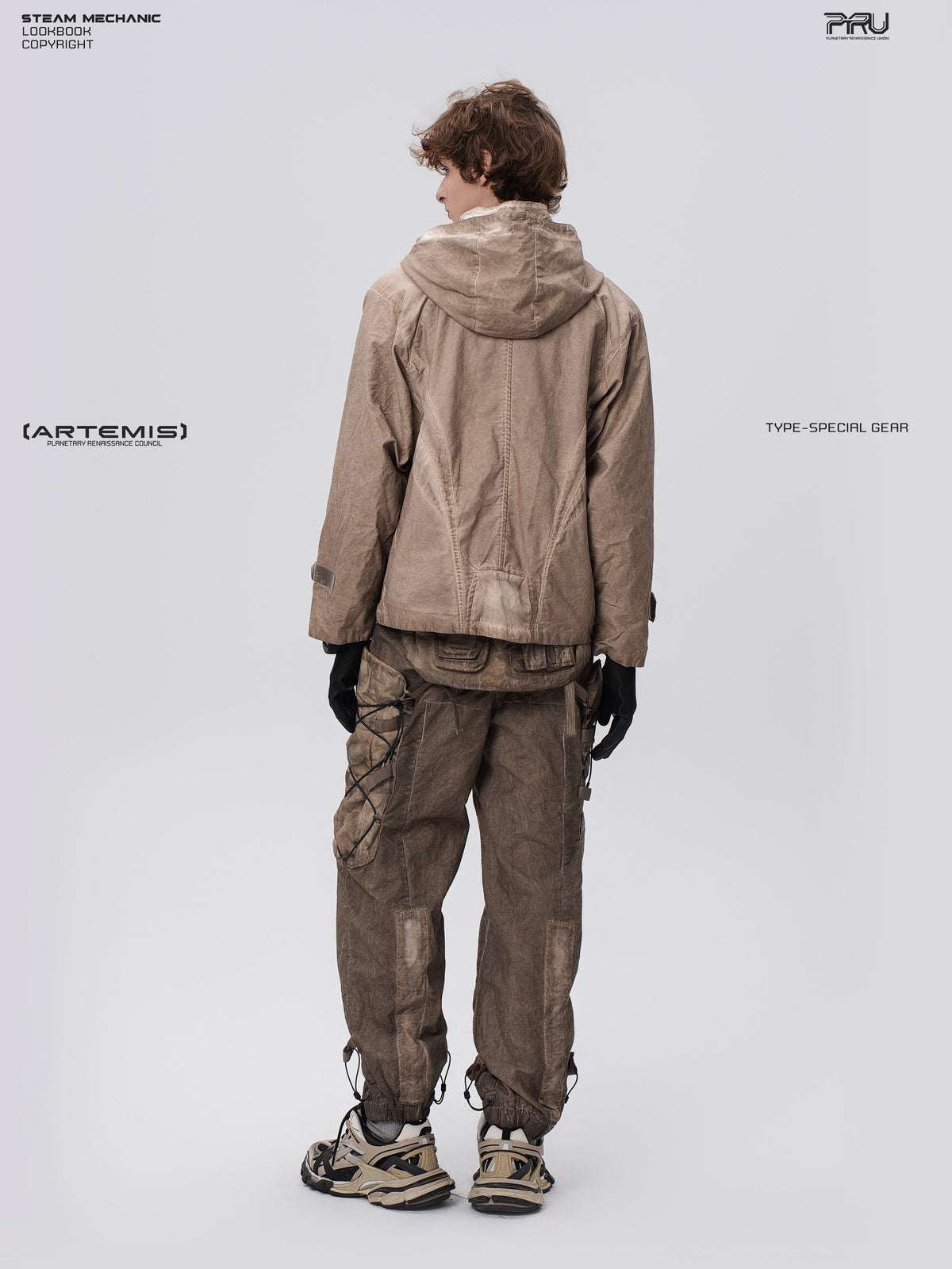 PIONEER gravel brown detachable-waist-bag work pants — full-length rear view styled with a hooded jacket
