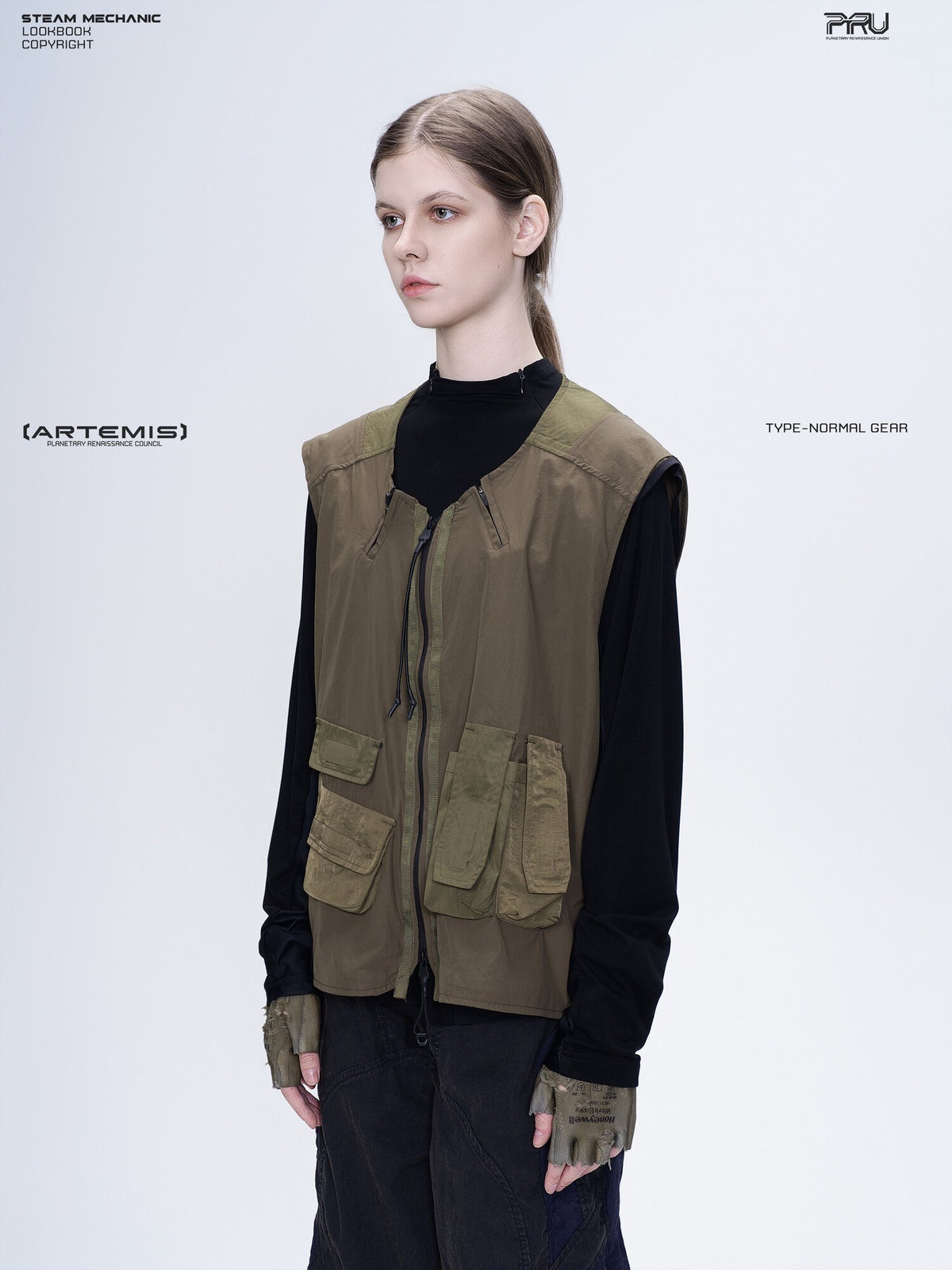 CLERIC utility nylon vest in vine gray green — three-quarter modeled close-up facing left, showing the curved neckline and pocket arrangement