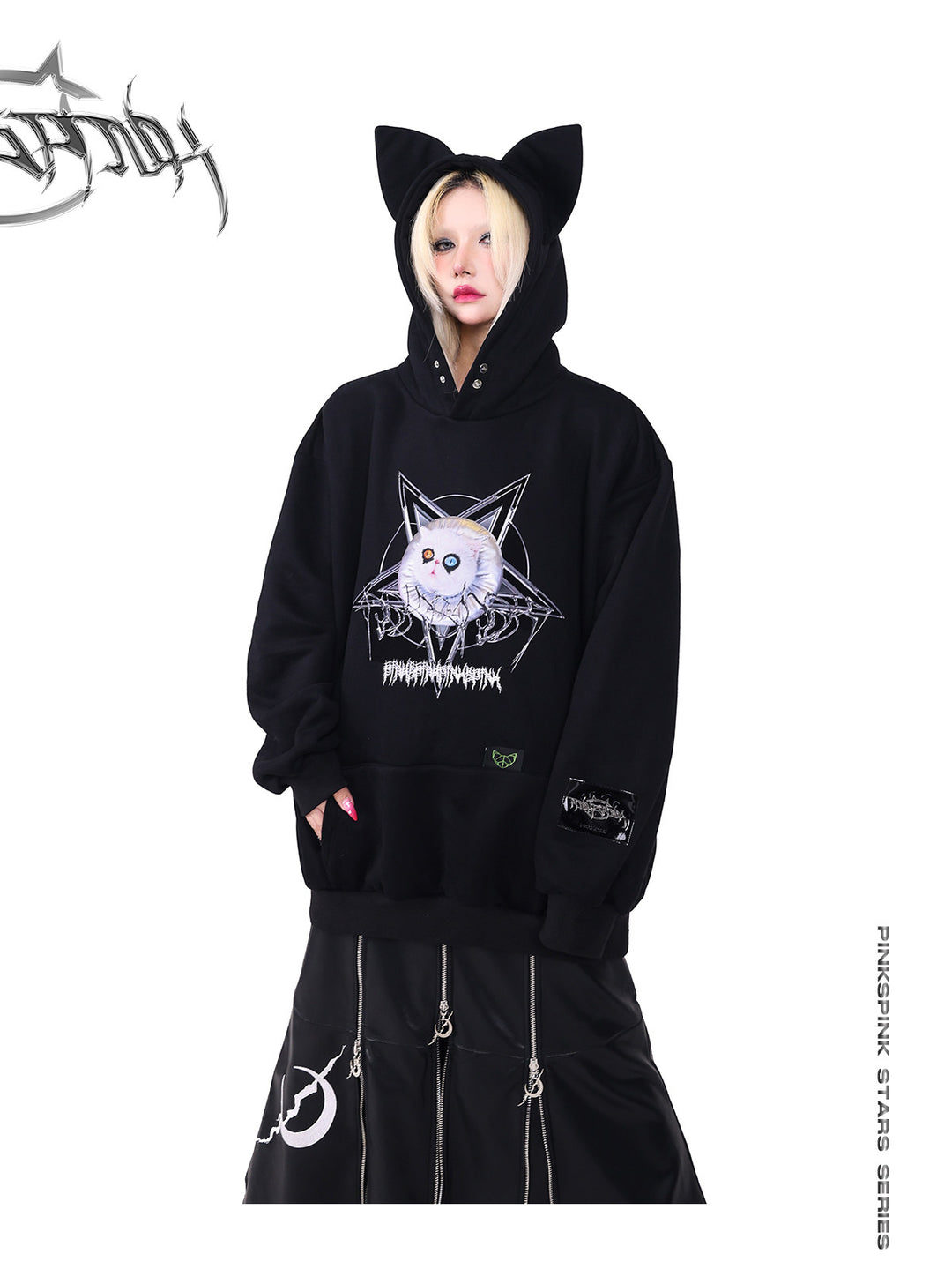 PINKSPINK ELECTRIC MOON zip-panel faux-leather maxi skirt — modeled close-up styled with a cat-ear hoodie