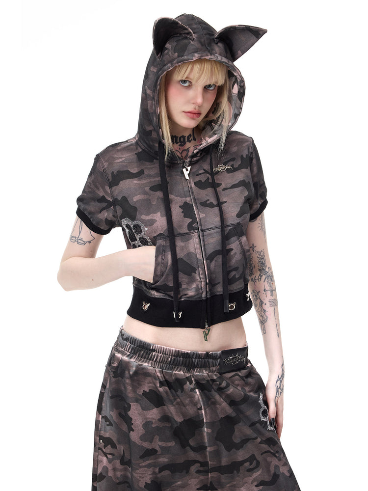 PINKSPINK CATPAW cropped cat-ear zip hoodie in gray-brown camouflage — closer hood-up front view with one hand in a pocket