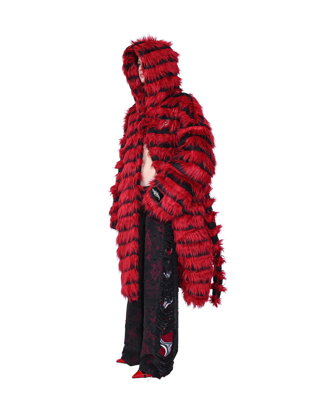 PINKSPINK ELECTRIC MOON black-red faux-fur hooded long coat — red and black three-quarter hood-up modeled view showing the open front