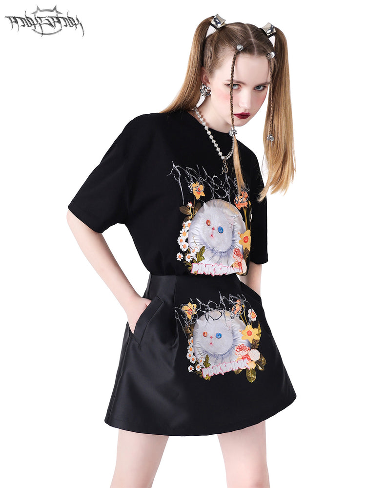 PINKSPINK GARFIELD graphic mini skirt — black modeled view with the matching tee