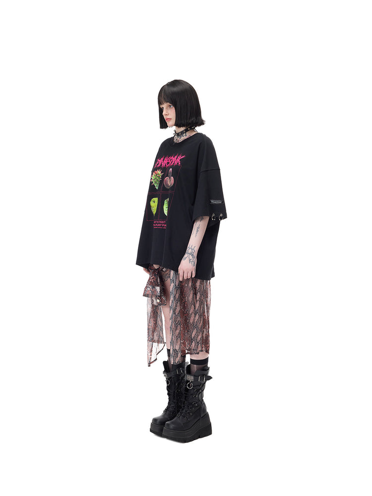 PINKSPINK PLANT PUNK oversized graphic tee in black — full-length side modeled view of the untucked hem and roomy silhouette