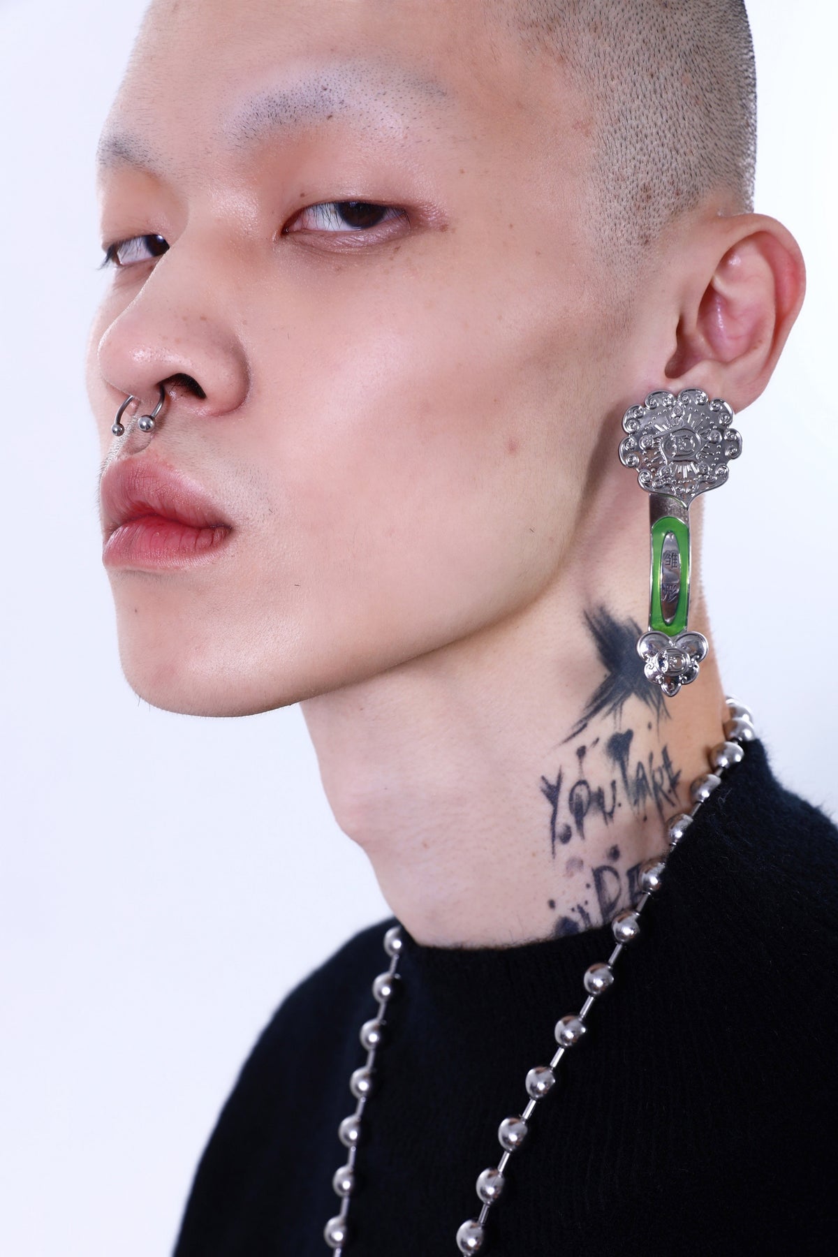EMBRYO RUYI detachable sculptural earrings — alternate modeled angle