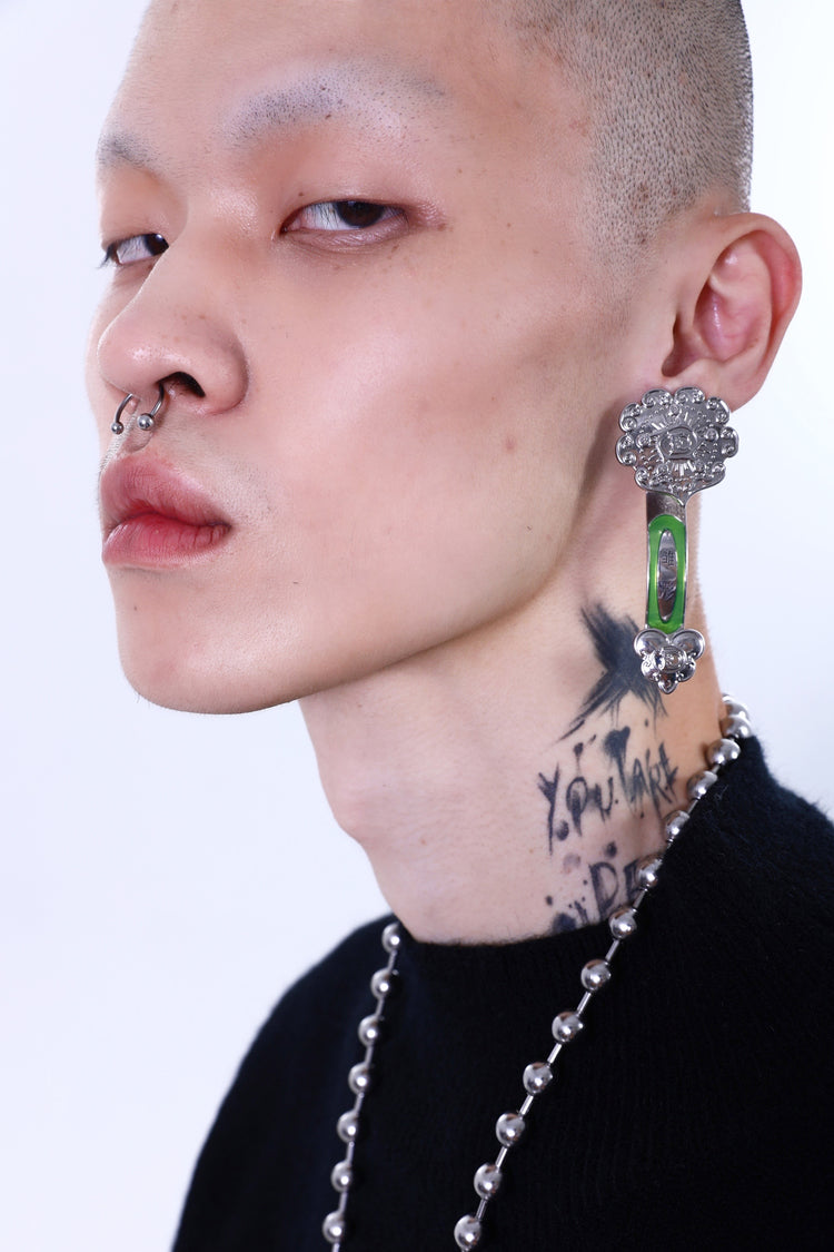 EMBRYO RUYI detachable sculptural earrings — alternate modeled angle