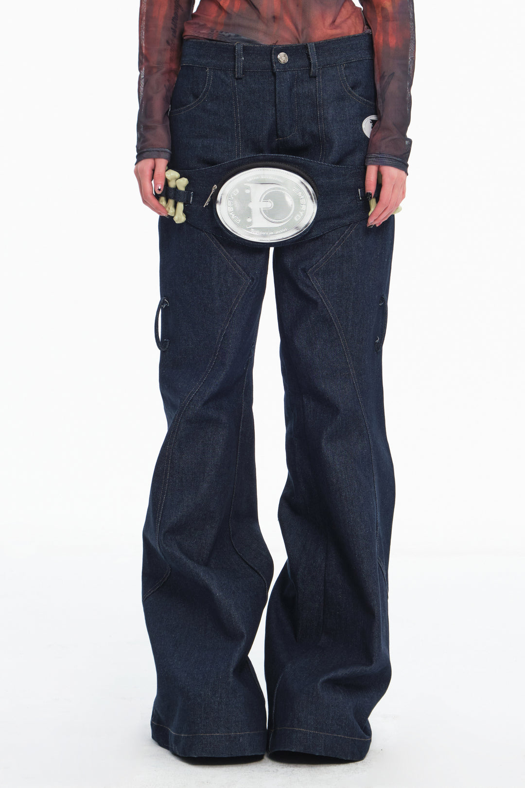 EMBRYO BONE FRAME low-rise flare pants & waist panel — close modeled view