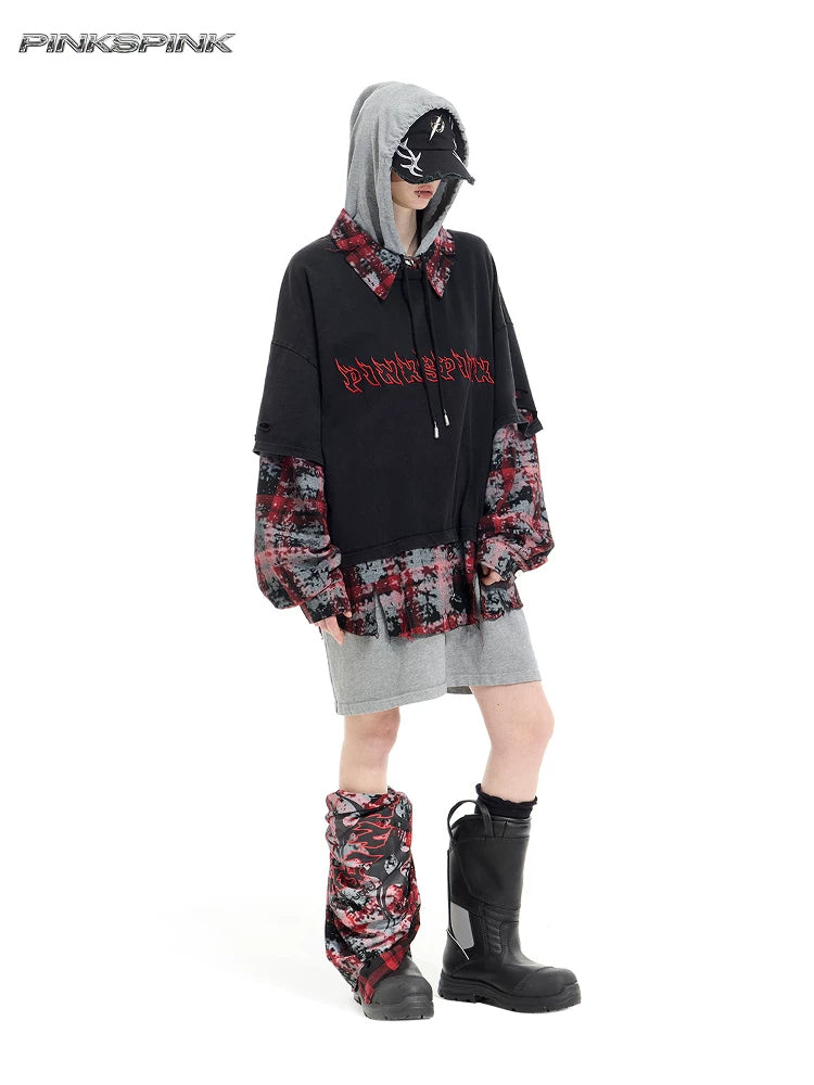 PINKSPINK REMAKE triple-layer plaid hoodie — black and red plaid hoodie — angled full-length view with hood up
